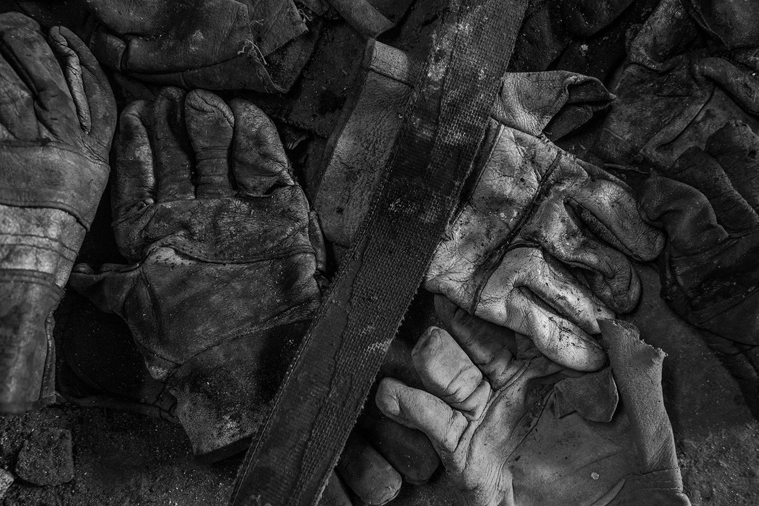 Belt and gloves of coal miners.