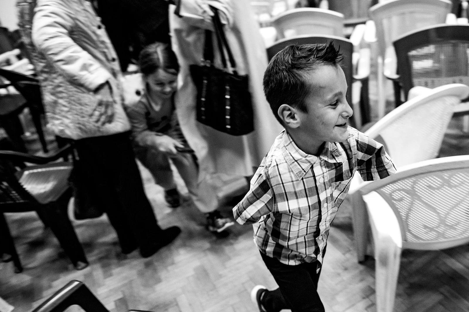 Ismail plays with friends at the book launch.