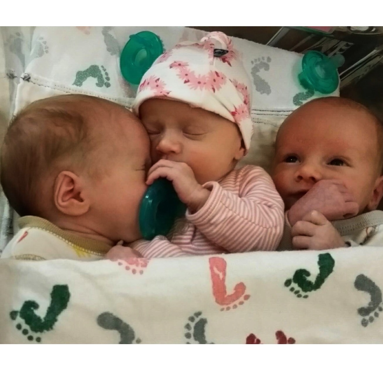Charlie & Claire sleeping with Dillon wide awake the night before his NICU discharge