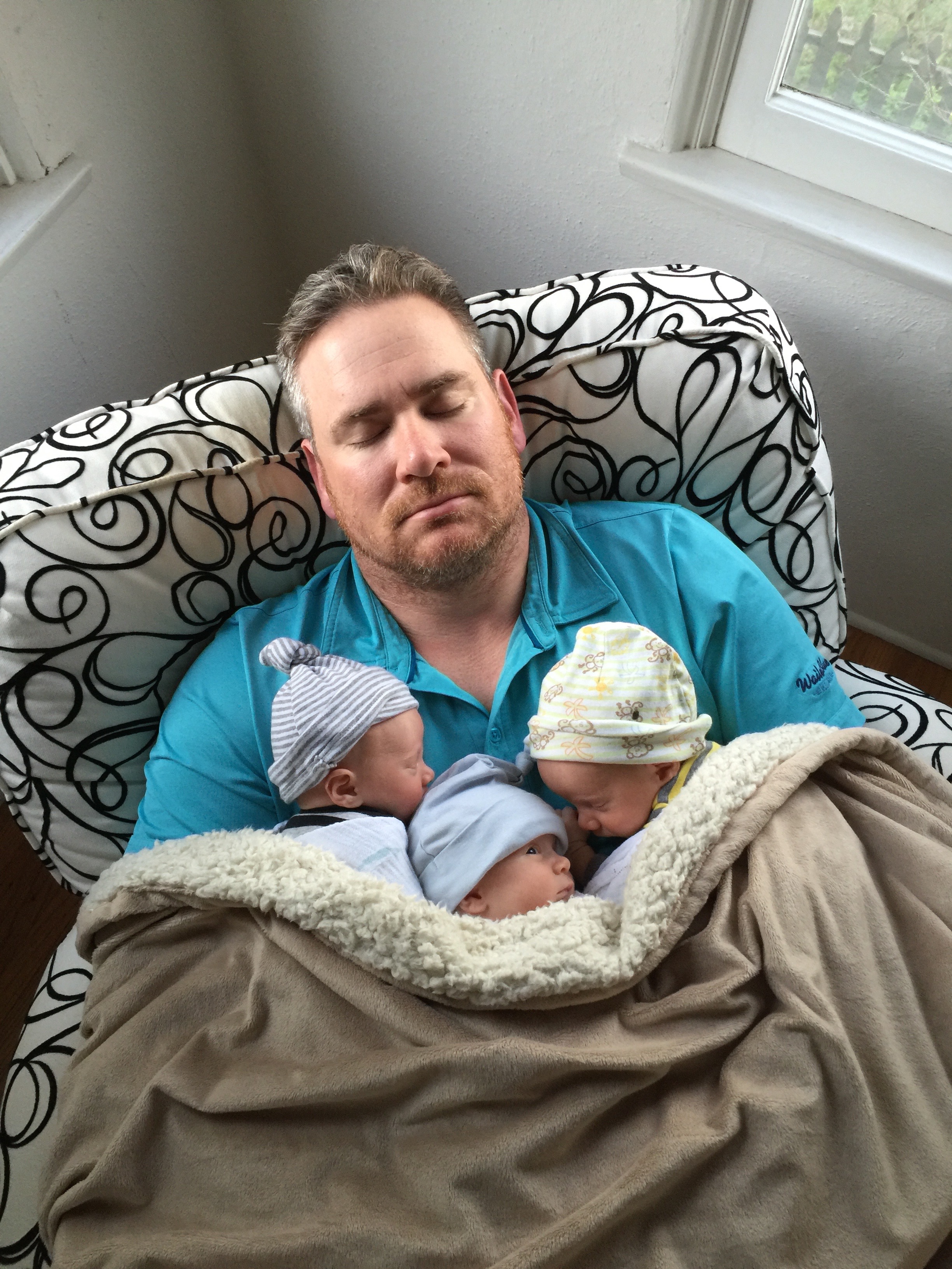 Dillon, Claire and Henry with dad. Claire is keeping her eye out for Baby Charlie, who's not quite ready to be home yet.