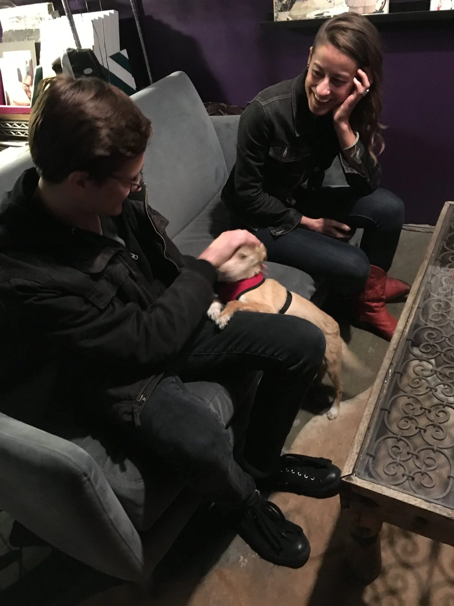 Curator and artist Lucas Lacamara and artist Rachel Wardenburg in coordinator and artist Sacha Baumann's Keystone studio discussing the show details. And playing with artist Avedon Arcade's pup.