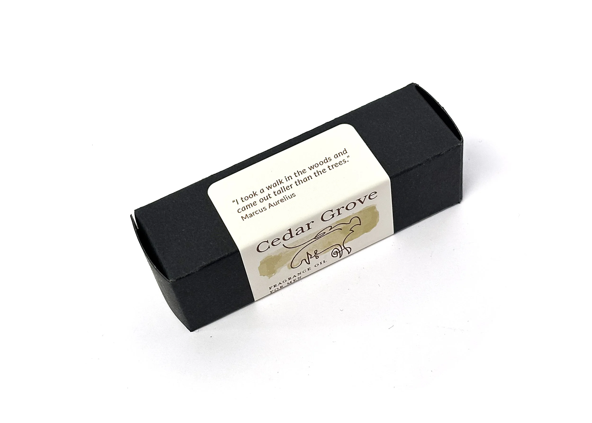 Cedar Grove natural fragrance oil for men with box, crafted with pure essential oils in organic MCT oil, emphasizing crisp, aromatic notes.