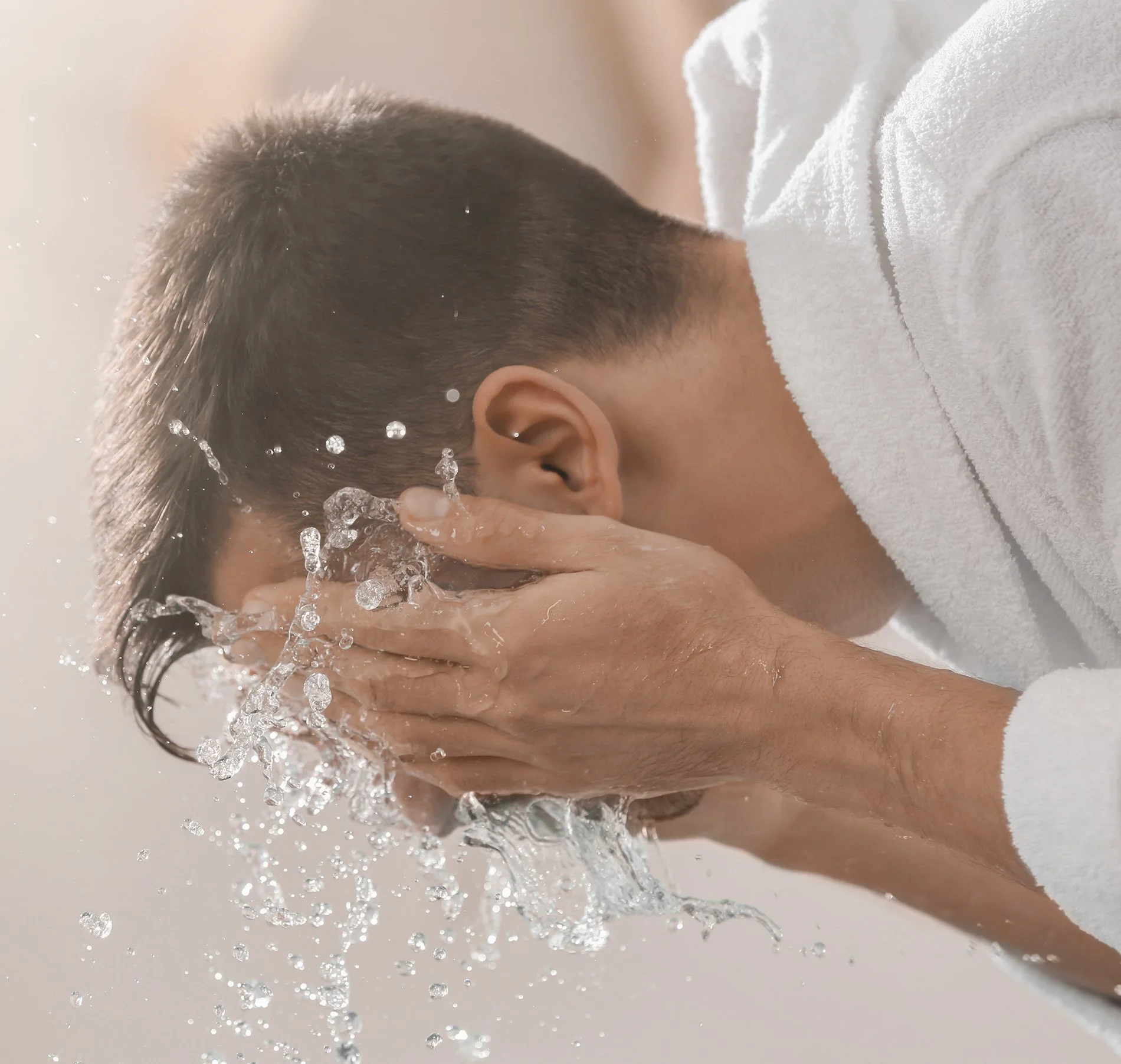 Wash your face with warm, not hot water
