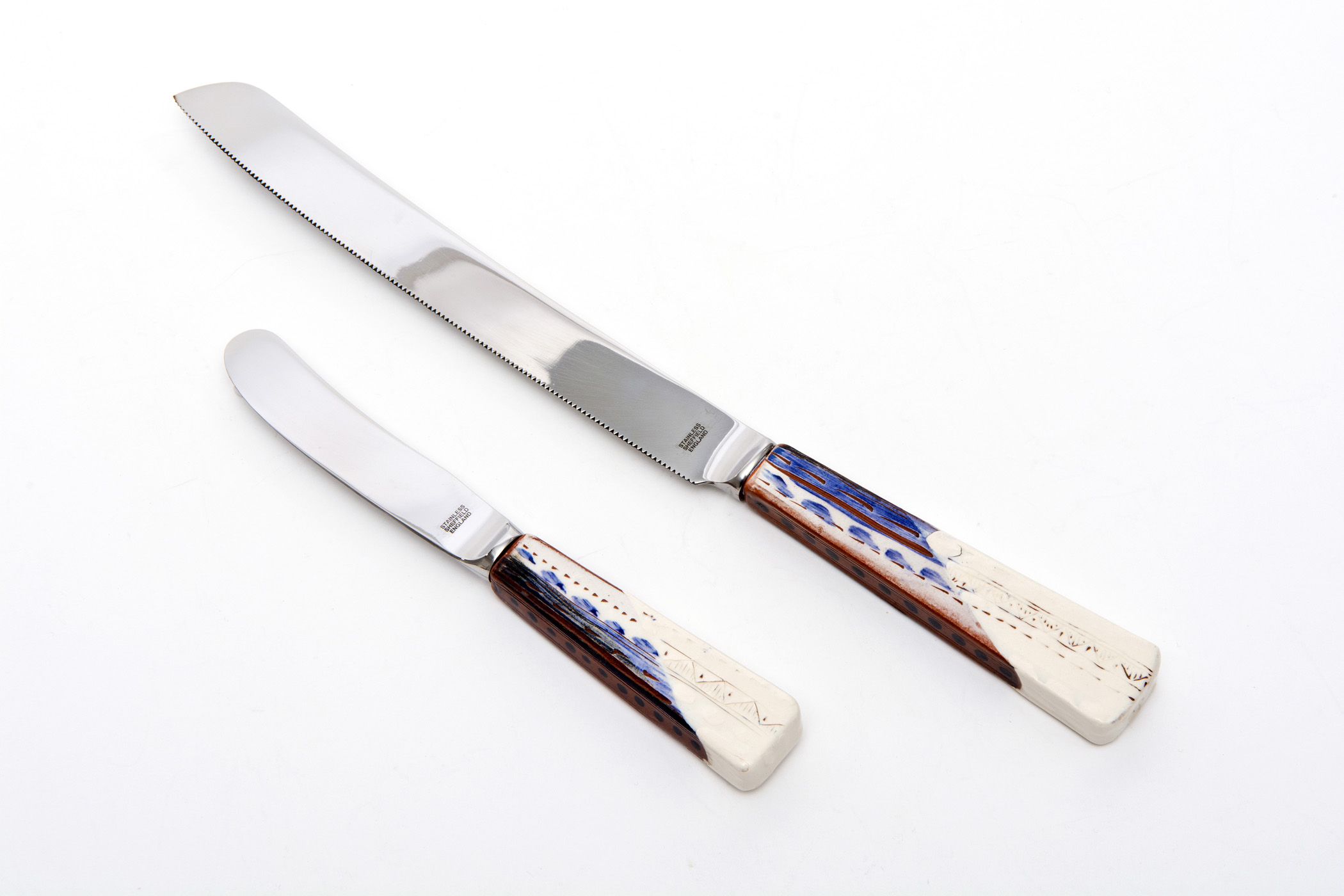  Bread Knife £75, Butter Knife £55 