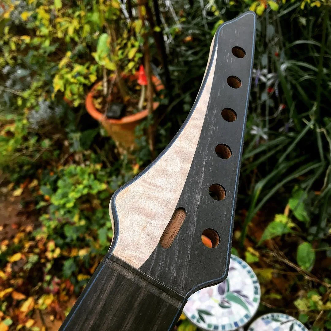 The other Kinloch Guitars headstock shape is Echo. The woods match the guitar body&rsquo;s top wood and the fingerboard.