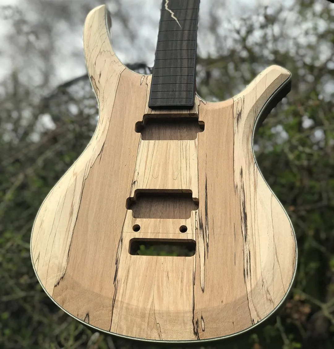Progress picture taken at twilight of the spalted beech Matterhorn. Fretting next, before installing vol &amp; tone pots before final sanding.

This one is getting a brushed nickel set of @bareknucklepickupsofficial &lsquo;The Mule&rsquo;s and a @hip