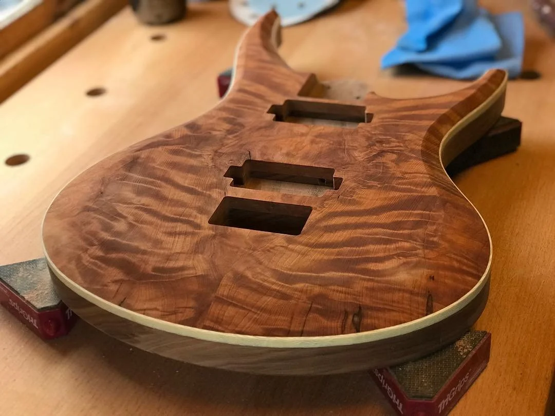 Sanding the redwood ready for epoxy hardening.
