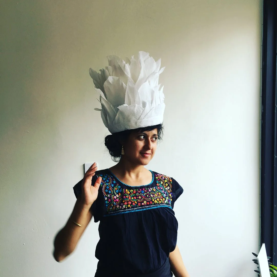 Me with a giant paper flower (one of my favorite crafts) on my head.