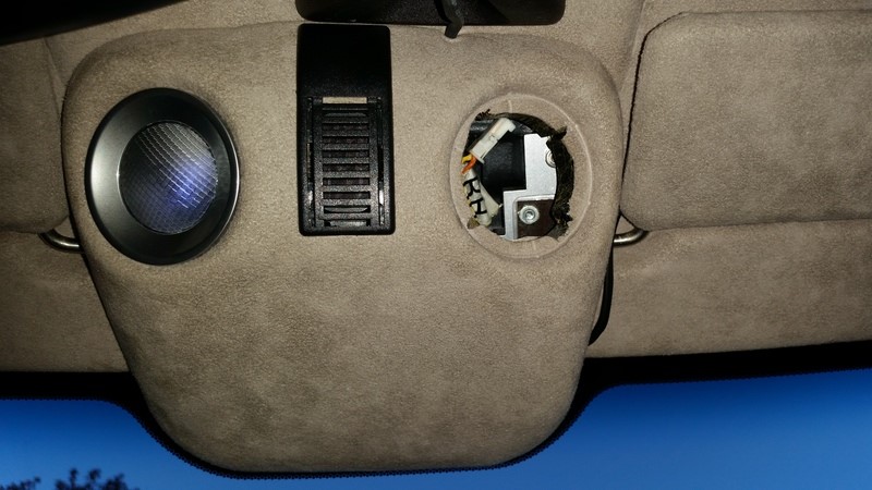 Watch the indents in the map light pod when refitting the light in its bezel.