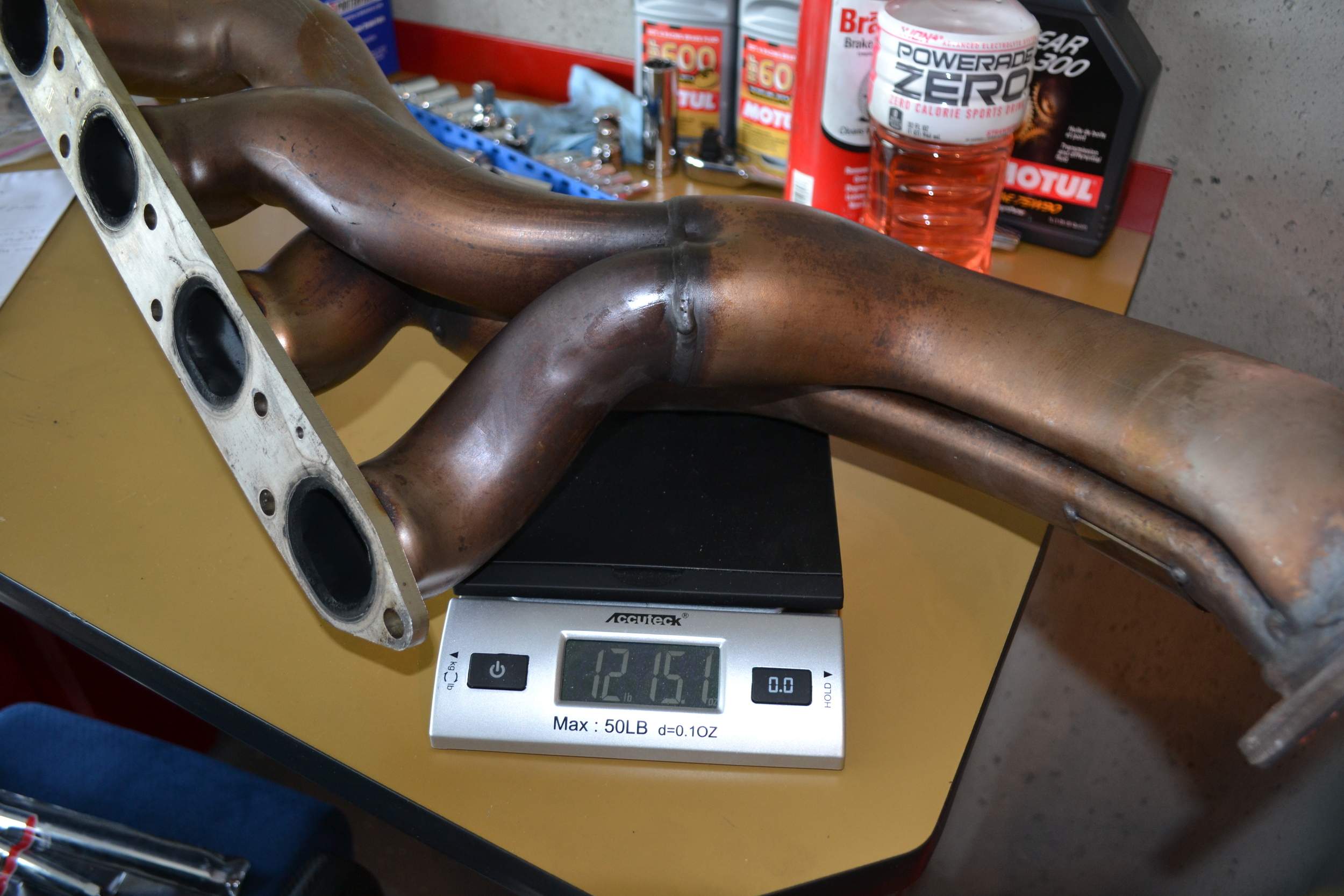 Left-side OEM 4.3L V8 exhaust manifold: 12 lbs 15.1 oz