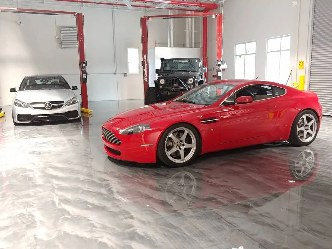 Our red V8 Vantage with BC Racing coilovers at their North American HQ.