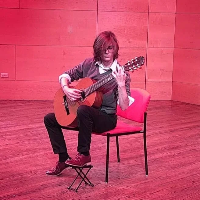 Hey there! Decided to turn this back on. I recently just finished my senior classical concert. If you are interested in listening to me play guitar, watching me make stupid faces, or want to watch an awkward person in the wild, please feel free follo