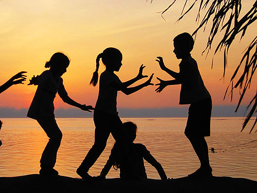 Children playing by ann_jutatip. Link to https://flic.kr/p/4Win59