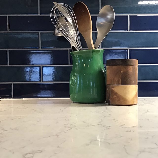 Countertops can play a big role in the aesthetic of a kitchen. They tie everything (cabinets, backsplash and flooring) together. Many countertop patterns have undertones that go unnoticed until placed up against another material. I had a friend whose