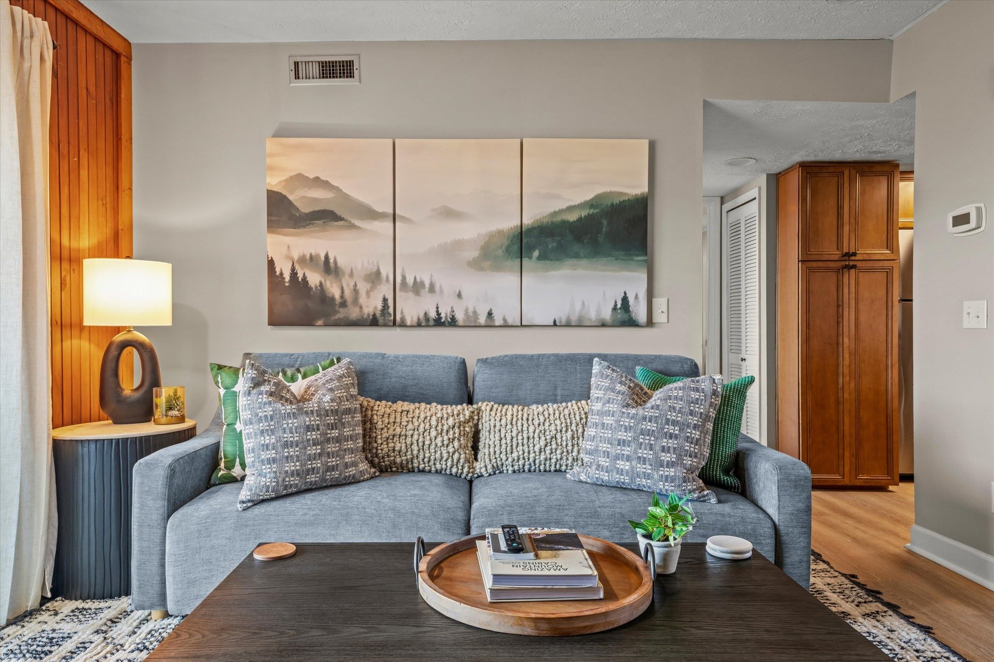 It's amazing what flooring, paint, and furniture can do in a tiny little condo...✨

This tiny mountain rental is a great base for mountain adventures in the Smokies - and now it feels much cleaner and cozier. Small spaces like this are overwhelming w