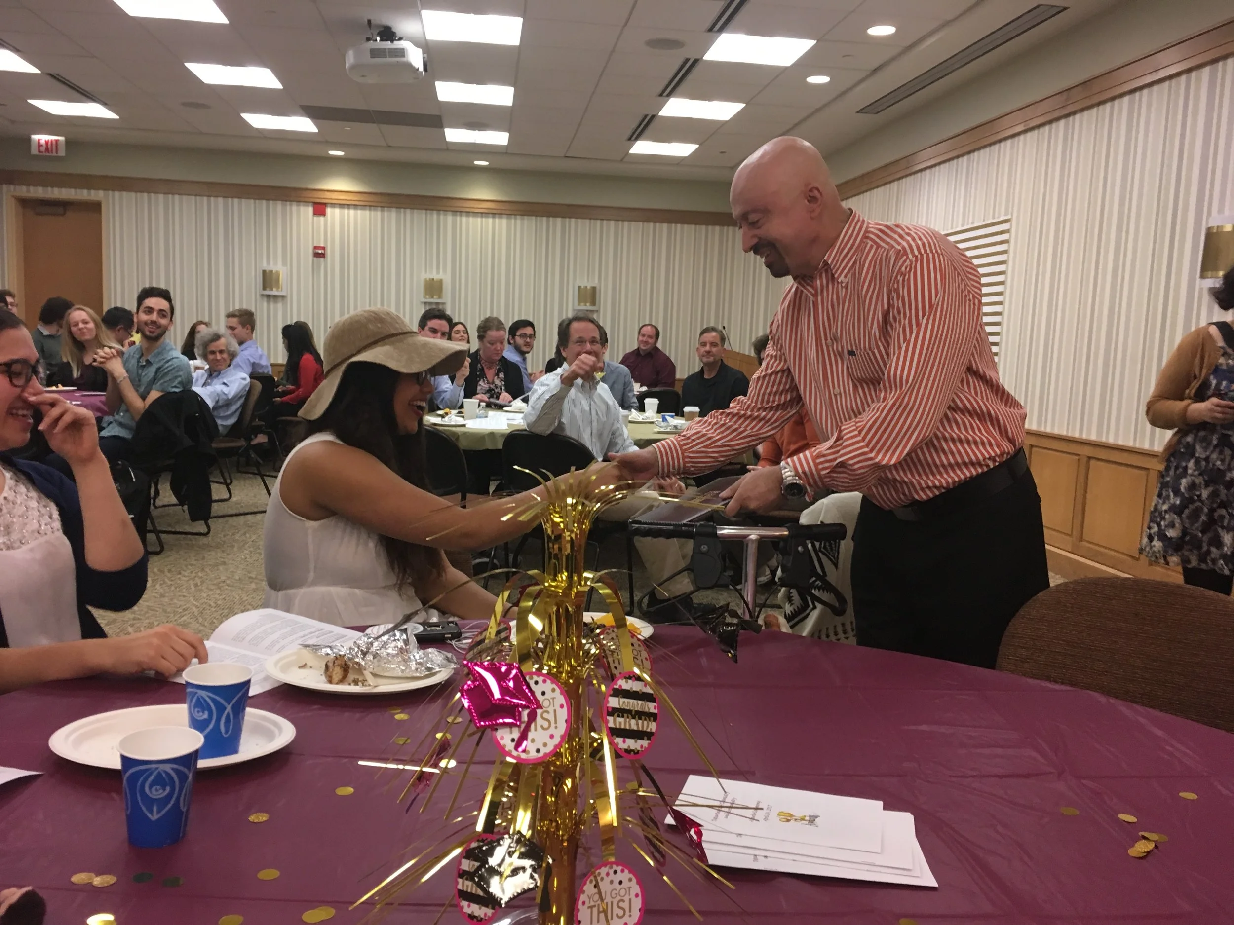  Dr. de Freitas awarding Yasmine Payne with the Louis Gluntz Family - Regis Scholarship 