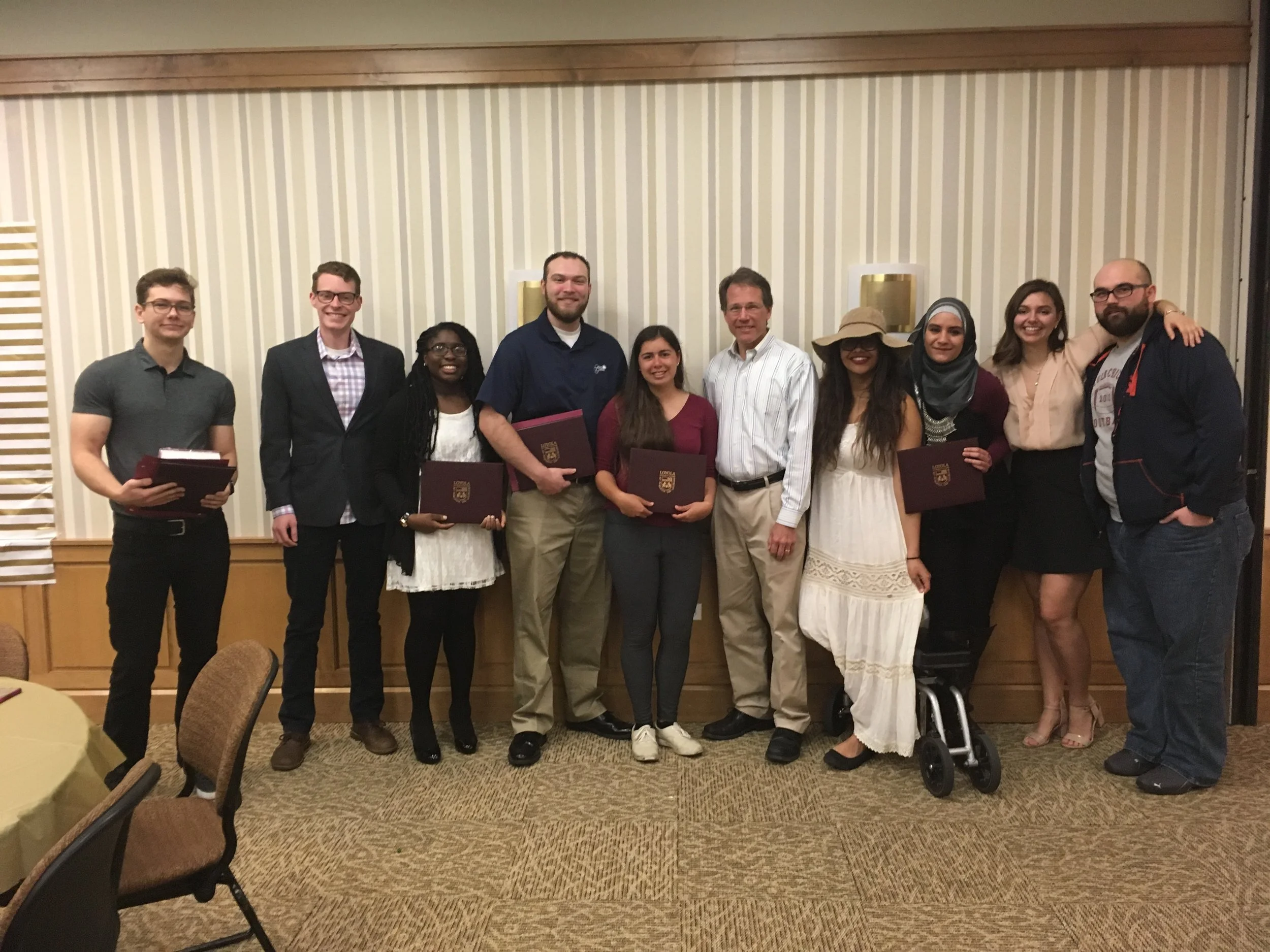  Becker Lab group photo at the Chemistry and Biochemistry Departmental Awards Ceremony on April 19, 2017.  Pictured from left to right: Max Moore, Peter Thoresen, Ademilola Tejuoso, JR Godlewski, Rachel Torrez, Dr. Becker, Yasmine Payne, Imand Darwis