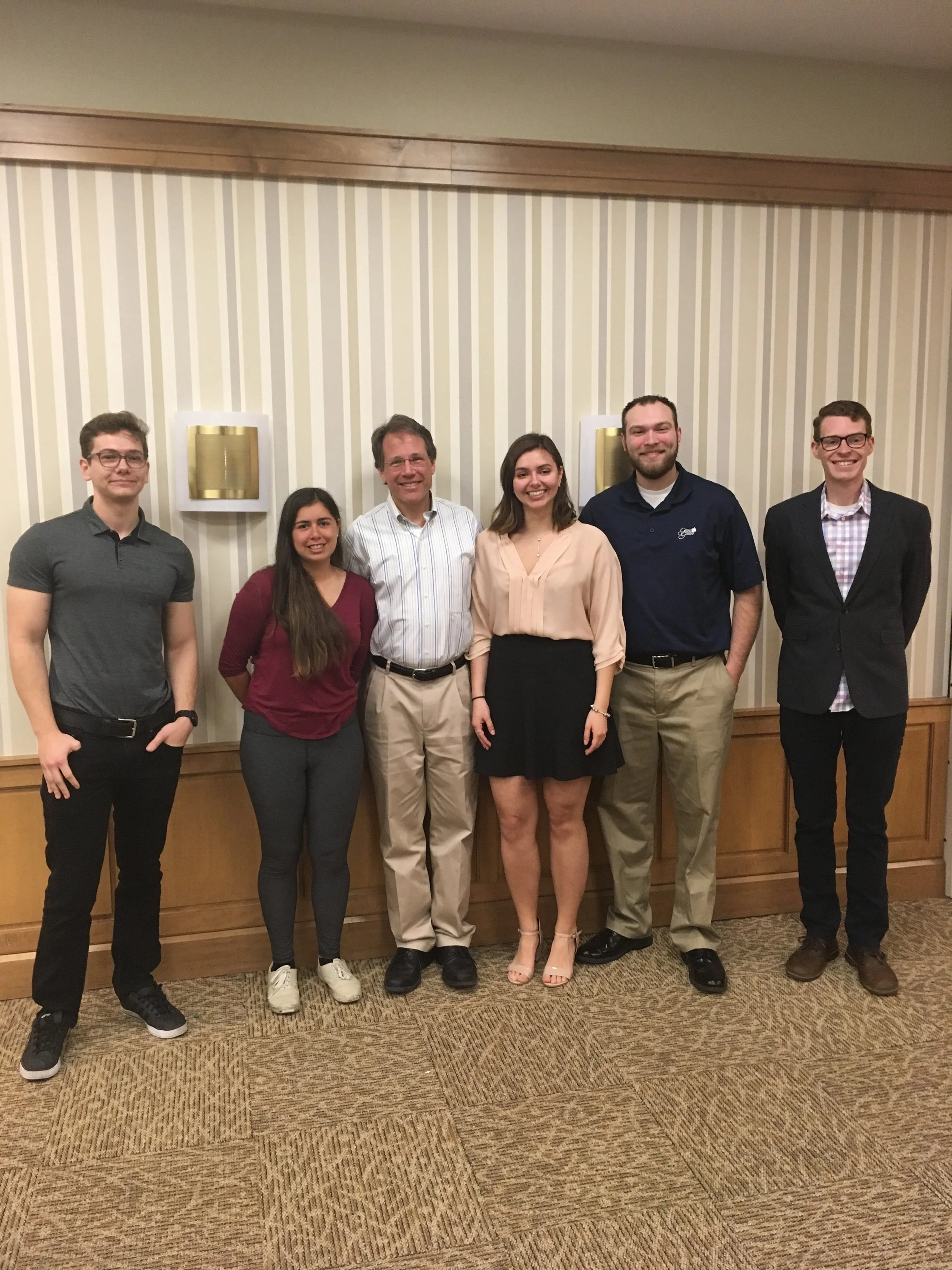  Dr. Becker with members of the 2017 graduating class.  Left to right: Max Moore, Rachel Torrez, Yuliya Politanska, JR Godlewski, and Peter Thoresen  