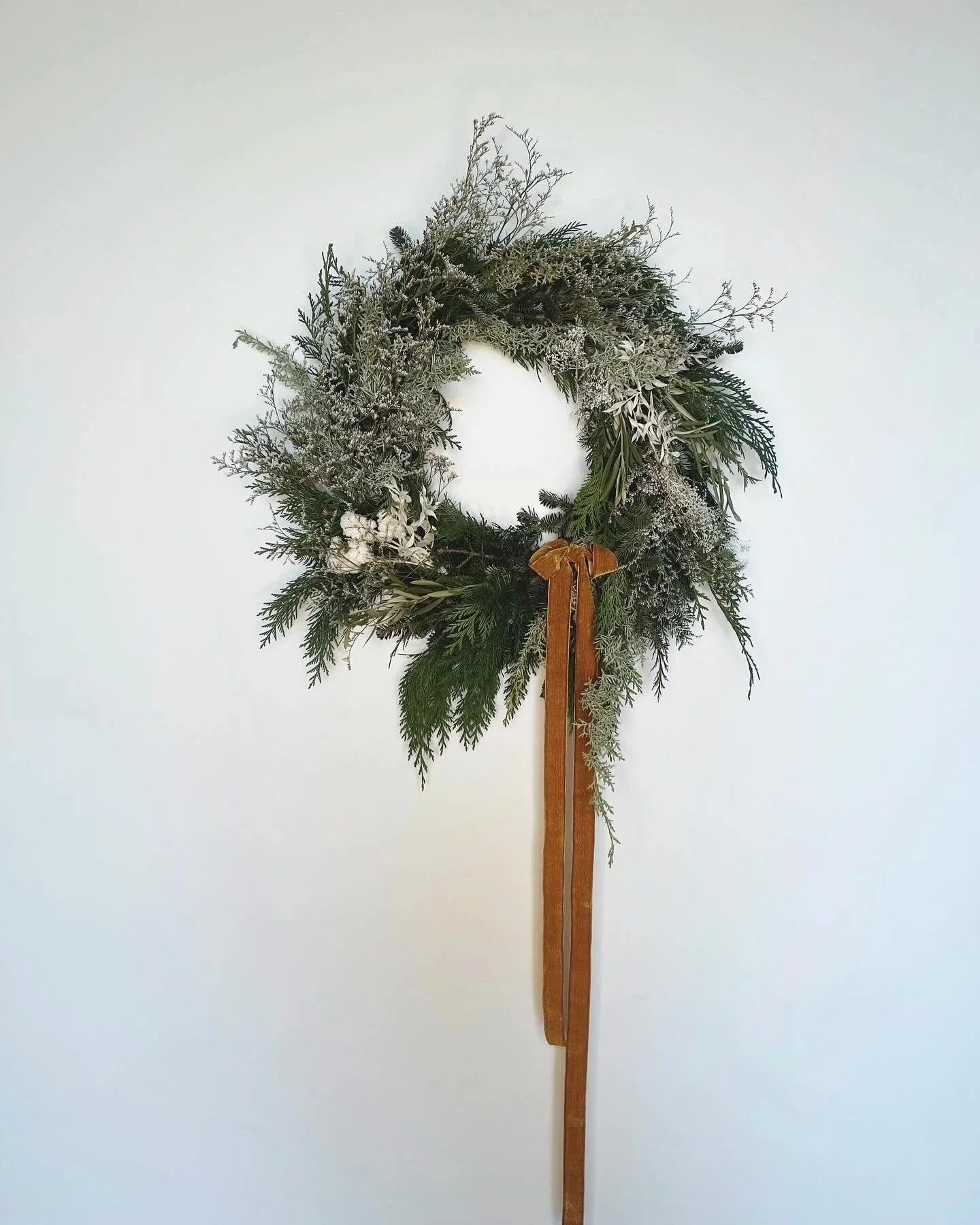 Fresh Holiday Wreaths 🎀 now available for the season! 

Our beautiful grapevine wreath is made with fresh cedar, pine, berries, dry florals &amp; decorated with your choice of ribbon. Custom wreaths available too. 
Perfect for your front door or hol