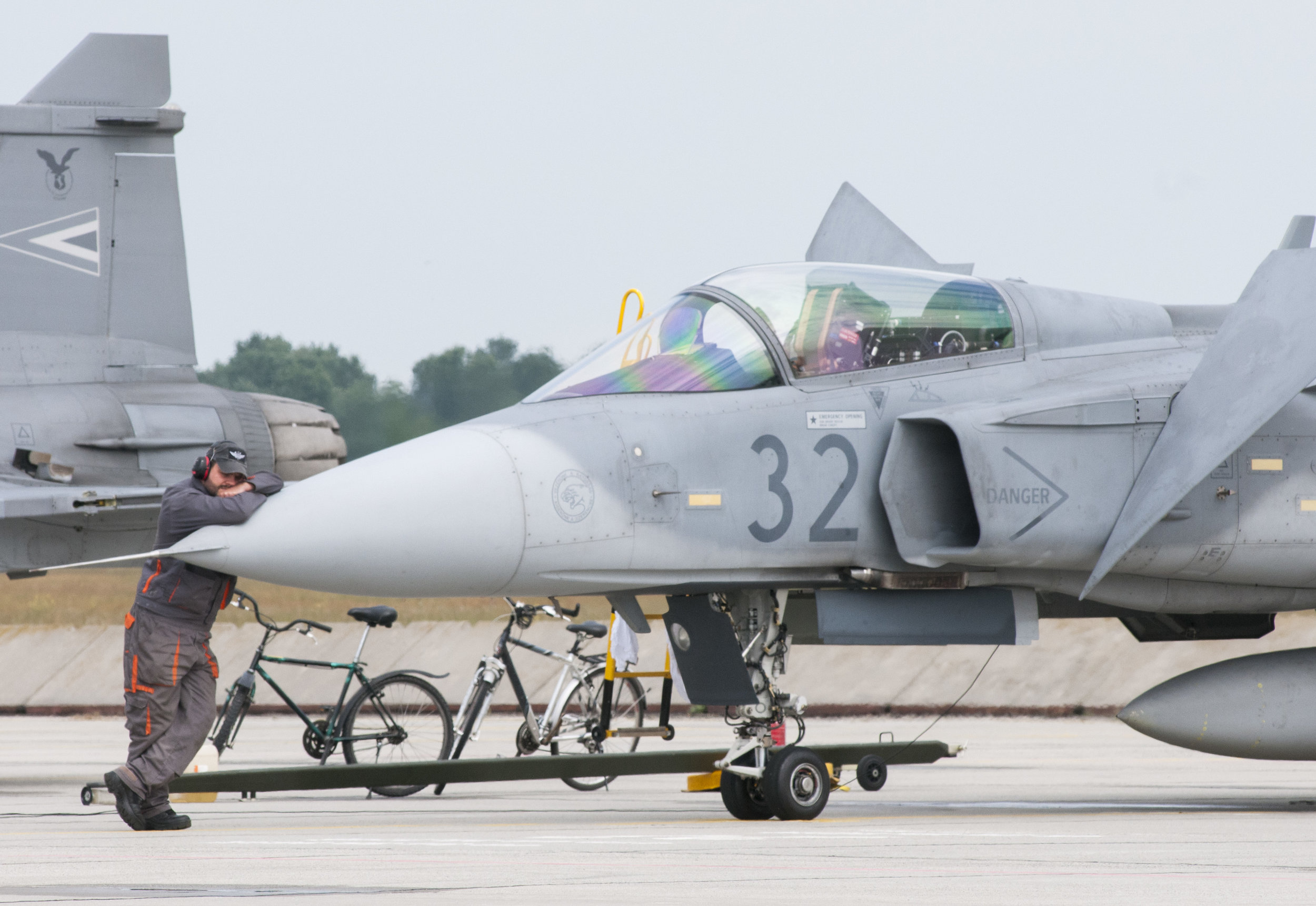 Hungarian Defense Force air crew members prepare the JAS-39 Grippen fighter jets before a "pilot's scramble" exercise in Kecskemét, Hungary on June 6, 2015. 