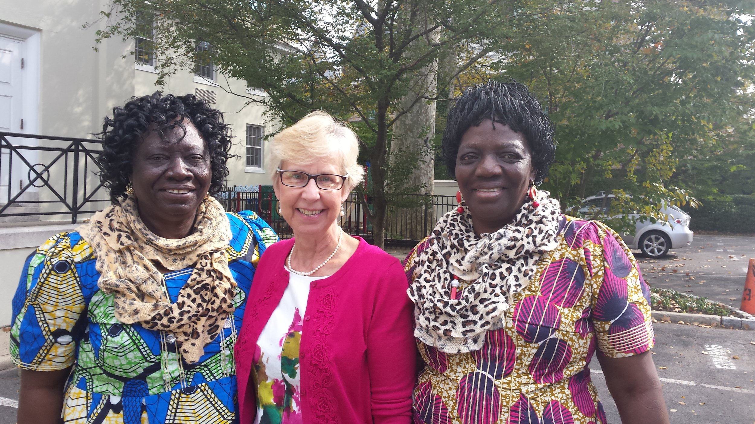The Rev. Joyce MacKichan Walker welcomes at Nassau Presbyterian Church; Maman Antoinette told (demonstrating her English!) about “Mata” who lives well with AIDS, thanks to FEBA.