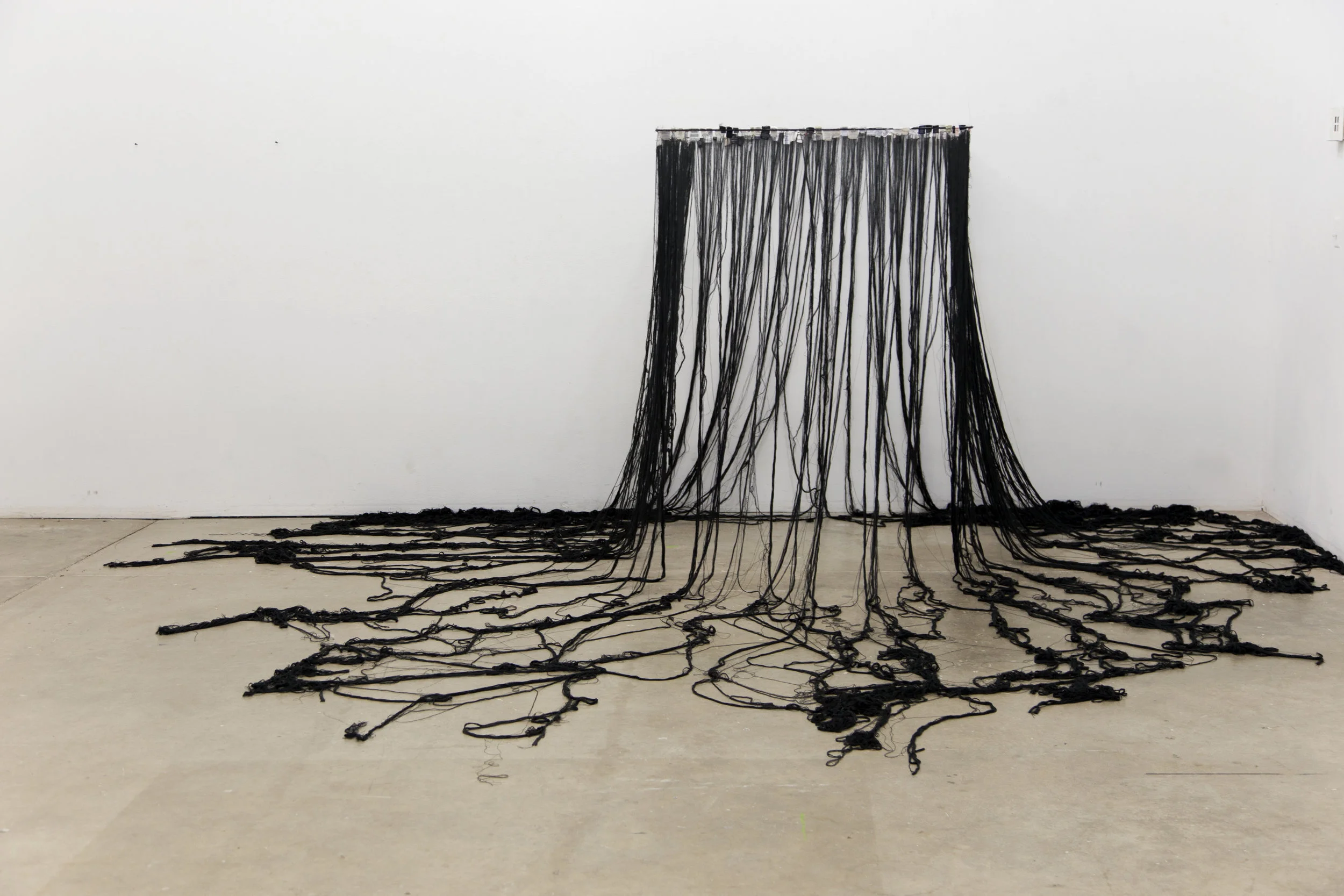 Closet, Archived Clothing tags, thread, steel. 2017