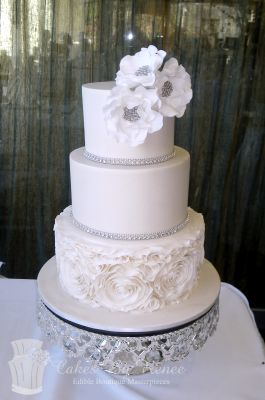 3 tier white wedding cake ruffles bling