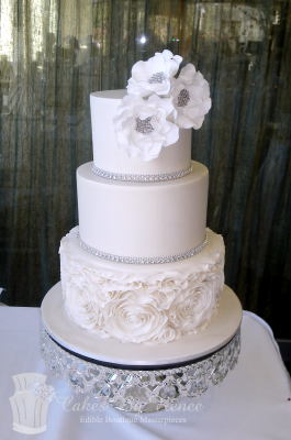 3 tier wedding cake white ivory rosettes ruffles flowers bling cake stand.png
