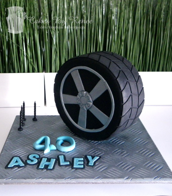 upright mag wheel cake 40th birthday cake tyre boys mens.png