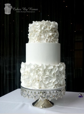 3 tier white wedding cake romantic ruffles