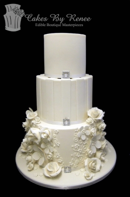 3 tier white wedding cake flowers stripes romantic