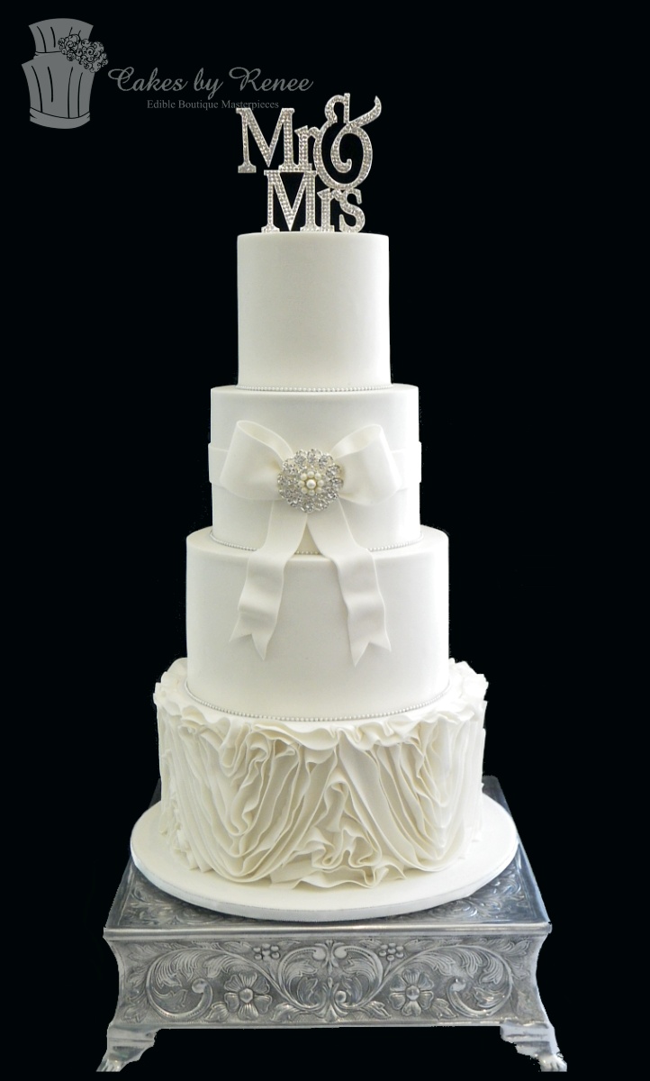 4 tier wedding cake all white ruffles frills bow