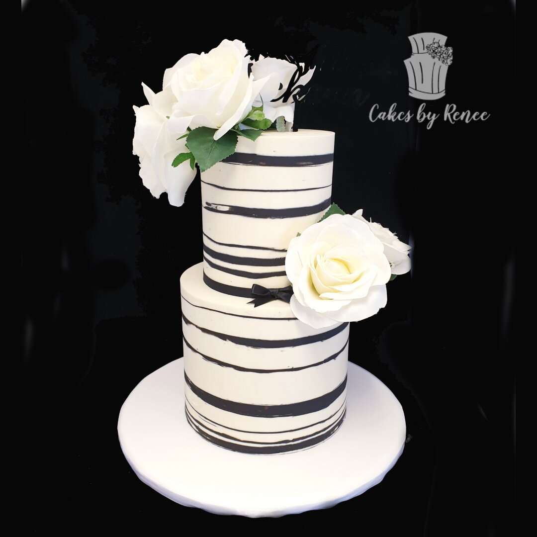 2 tier wedding cake black and white flowers modern