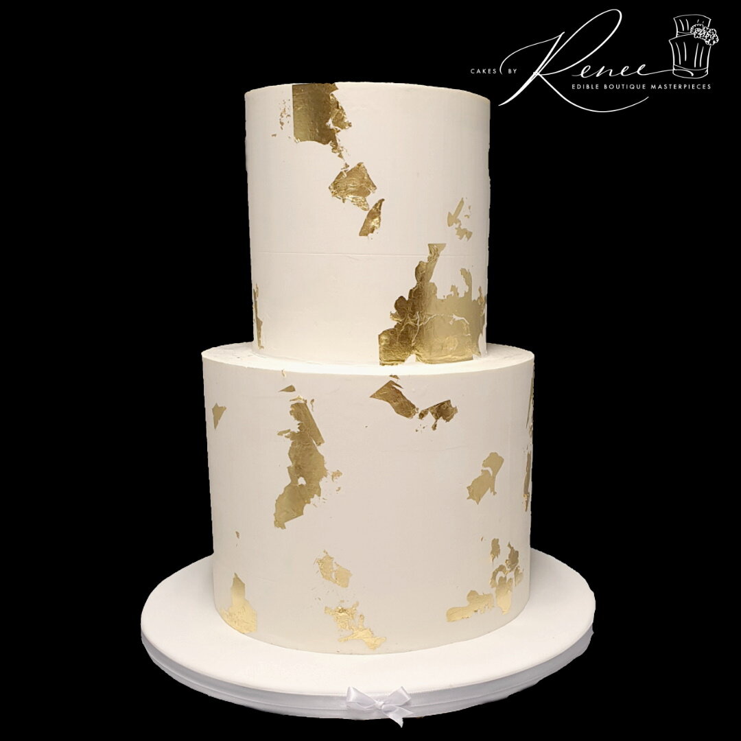 2 tier white wedding cake gold leaf modern clean
