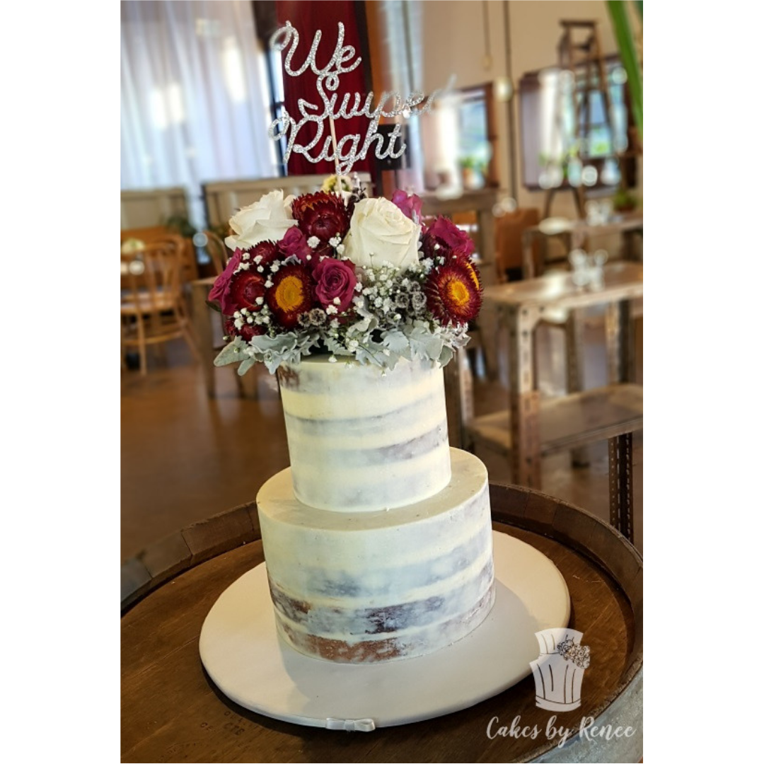 2 tier semi naked wedding winter floral topper