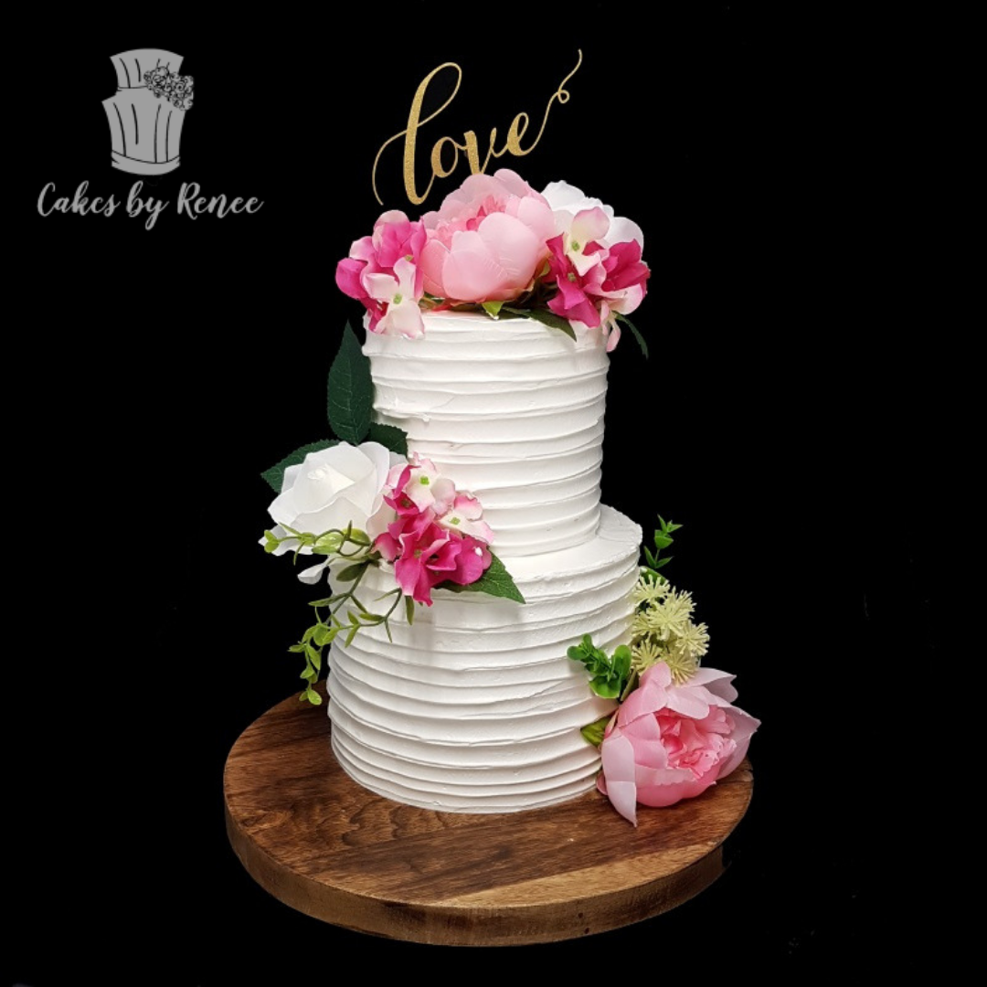 2 tier textured finish fresh flowers pink wedding cake