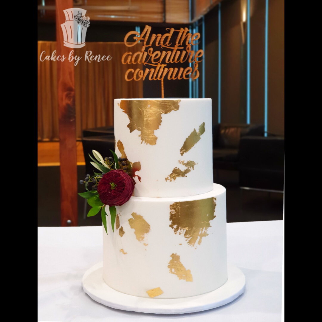 2 tier white wedding cake gold leaf simple flower custom topper