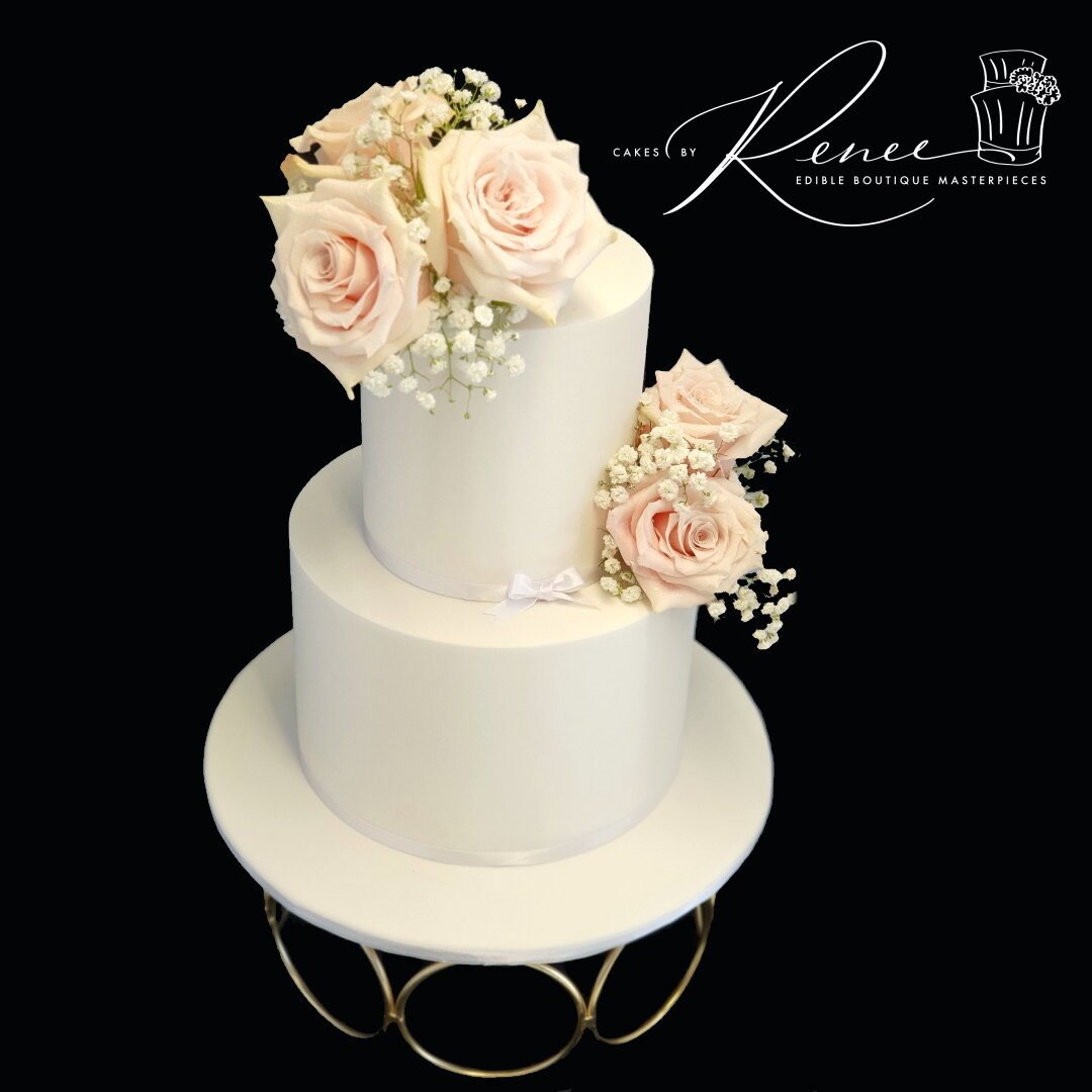 2 tier white wedding cake fresh roses simple beautiful