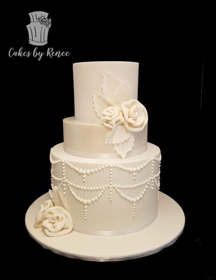 3 tier white wedding cake traditional ribbon roses piping satin finish