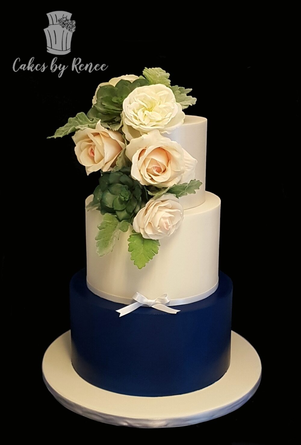 3 tier wedding cake navy blue peach flowers