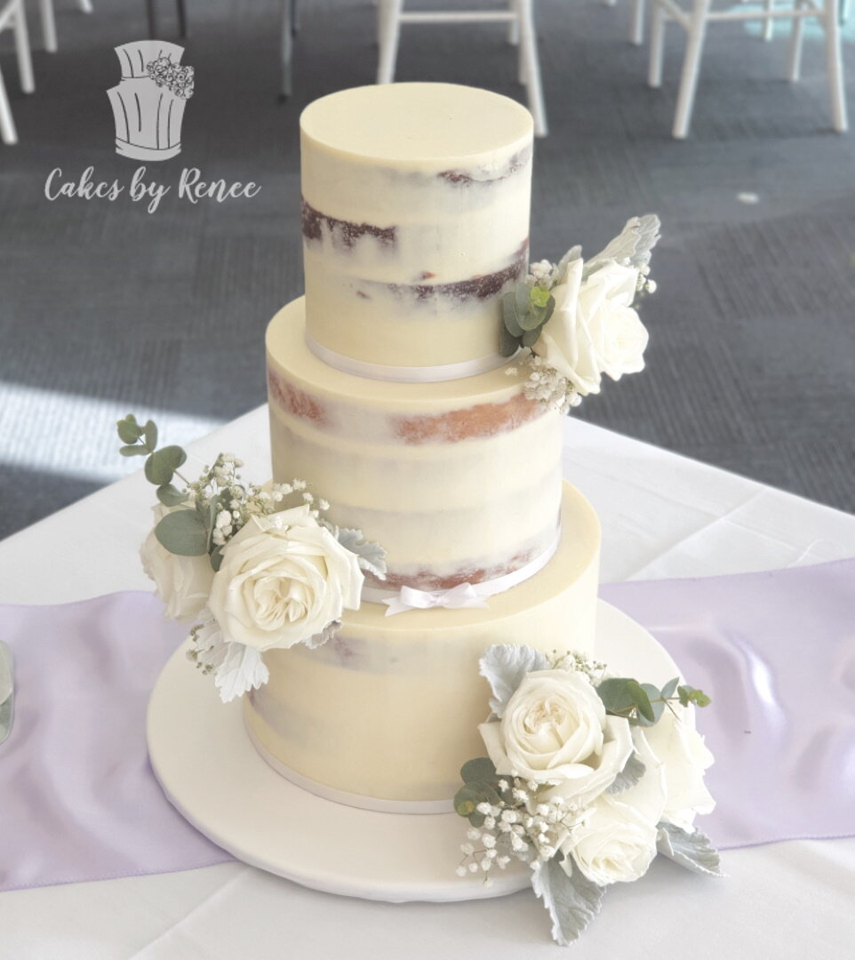 3 tier semi naked wedding cake fresh flowers