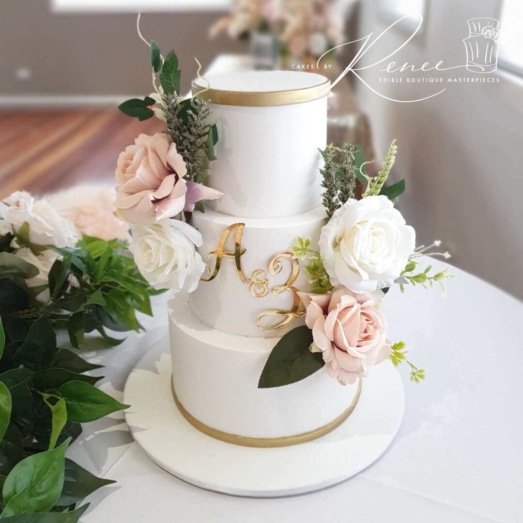 3 tier white wedding cake acrylic gold plaque initials peach white flowers