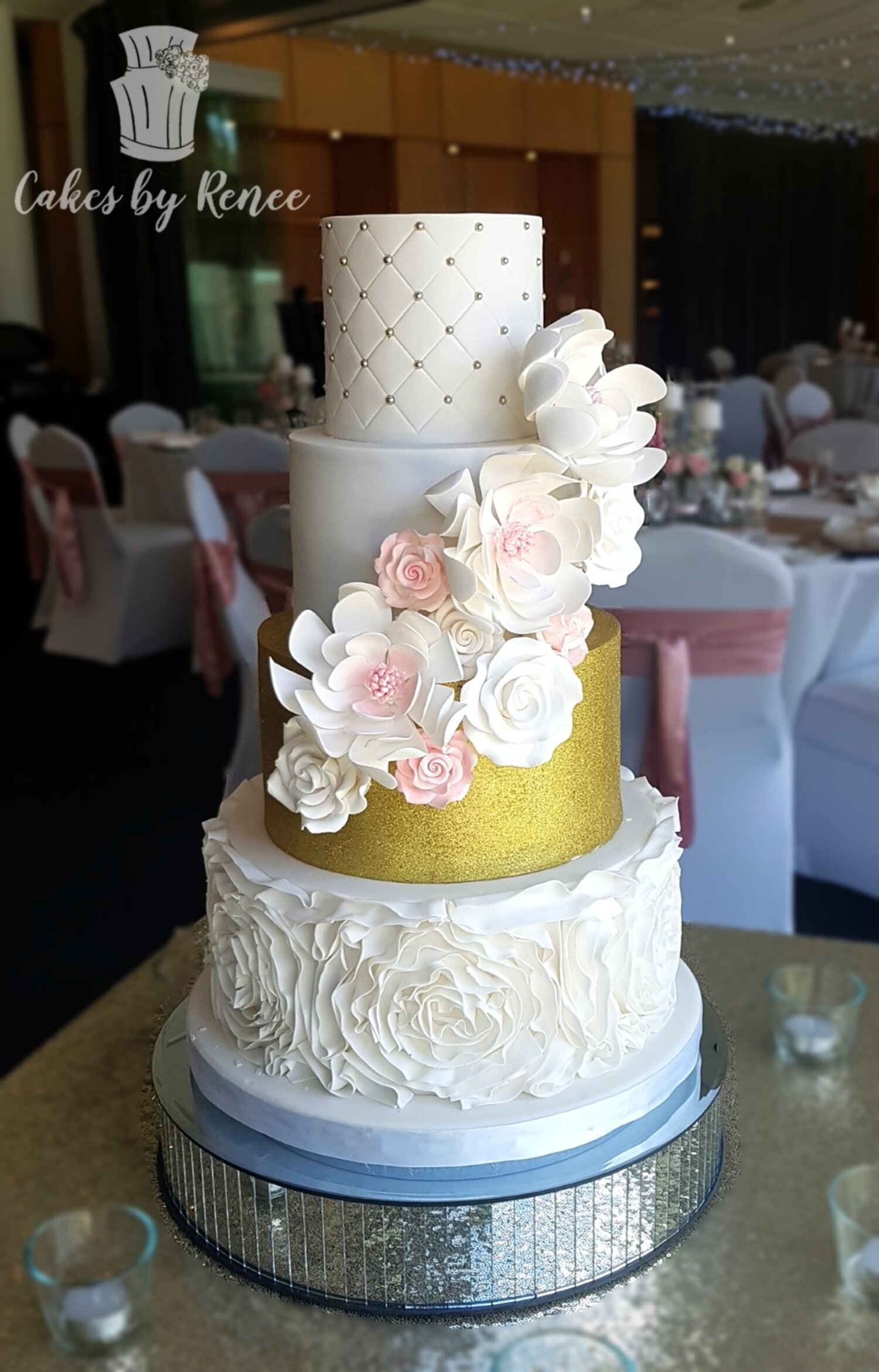 4 tier white wedding cake gold fondant frills ruffles flowers