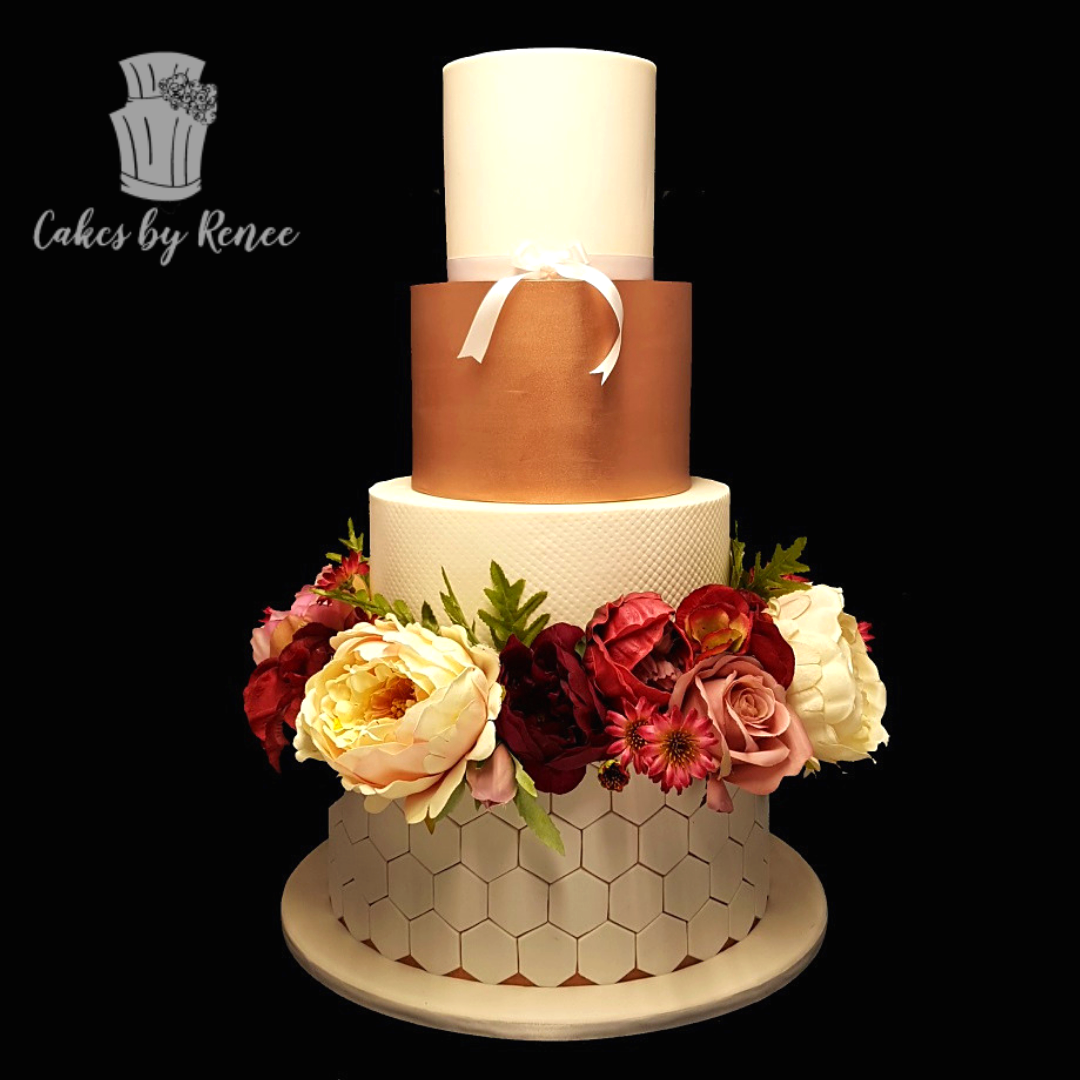 4 tier white wedding cake copper rose gold floral wreath ring