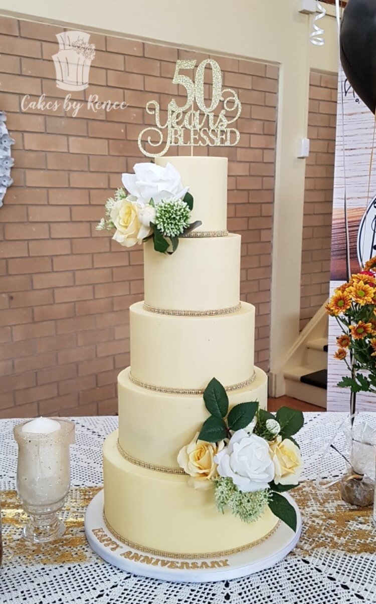 5 tier wedding cake pale yellow flowers custom topper