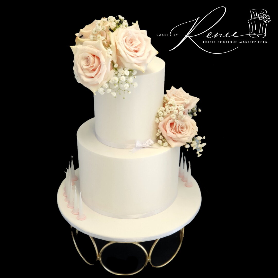 2 tier white birthday cake romantic fresh flowers