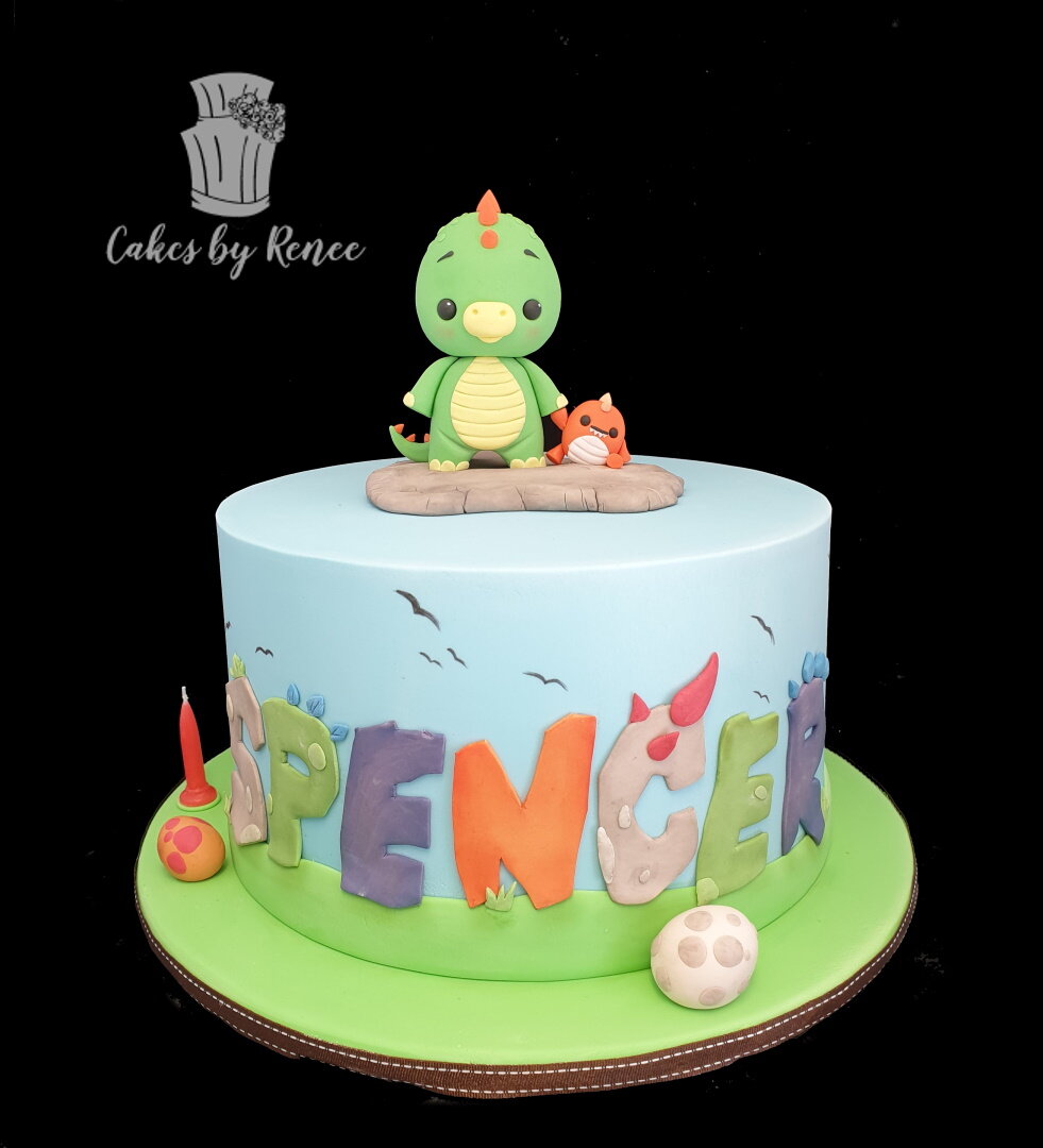 Cute dinosaur topper birthday cake