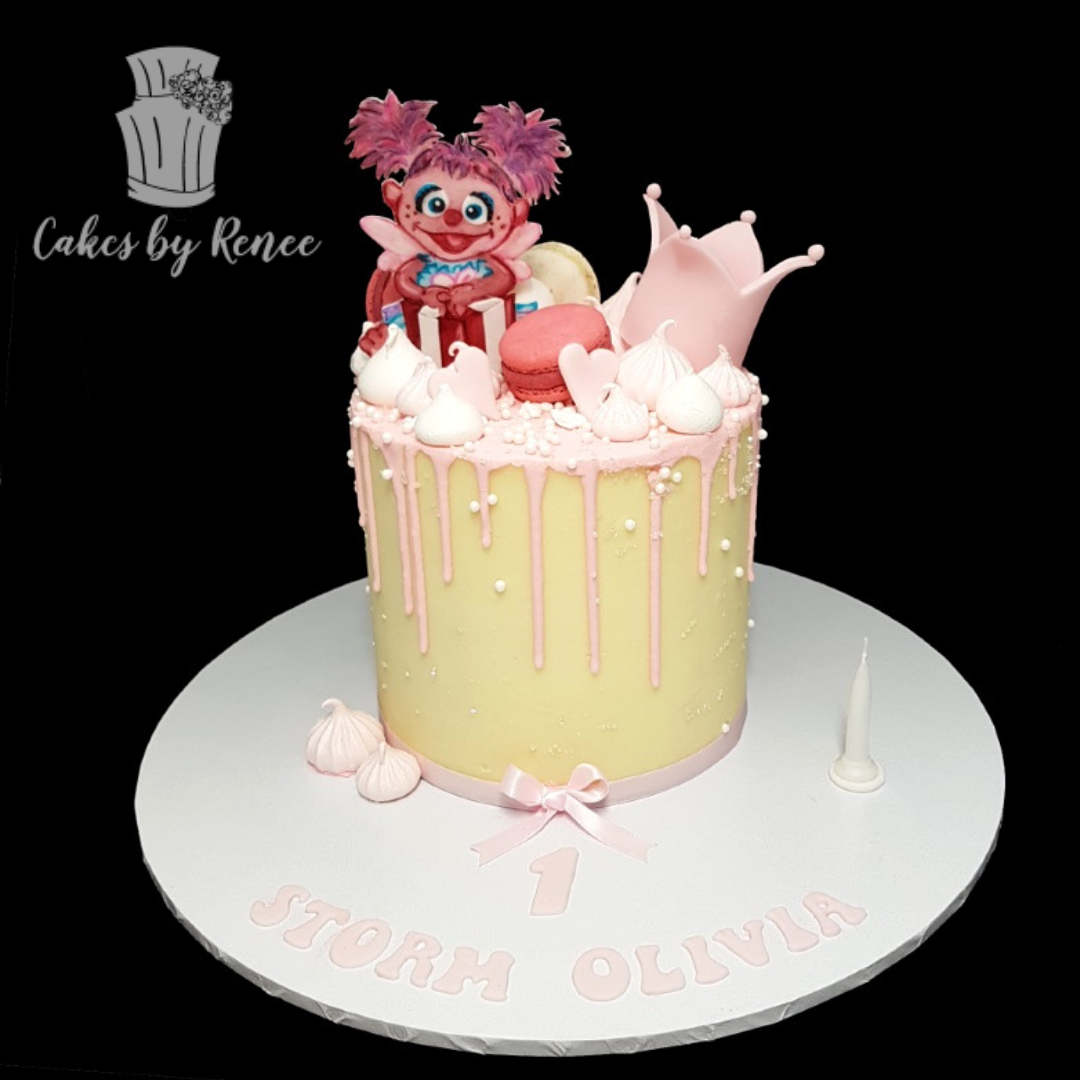 Gabby pink white drip birthday cake pink crown princess lollipops pretty
