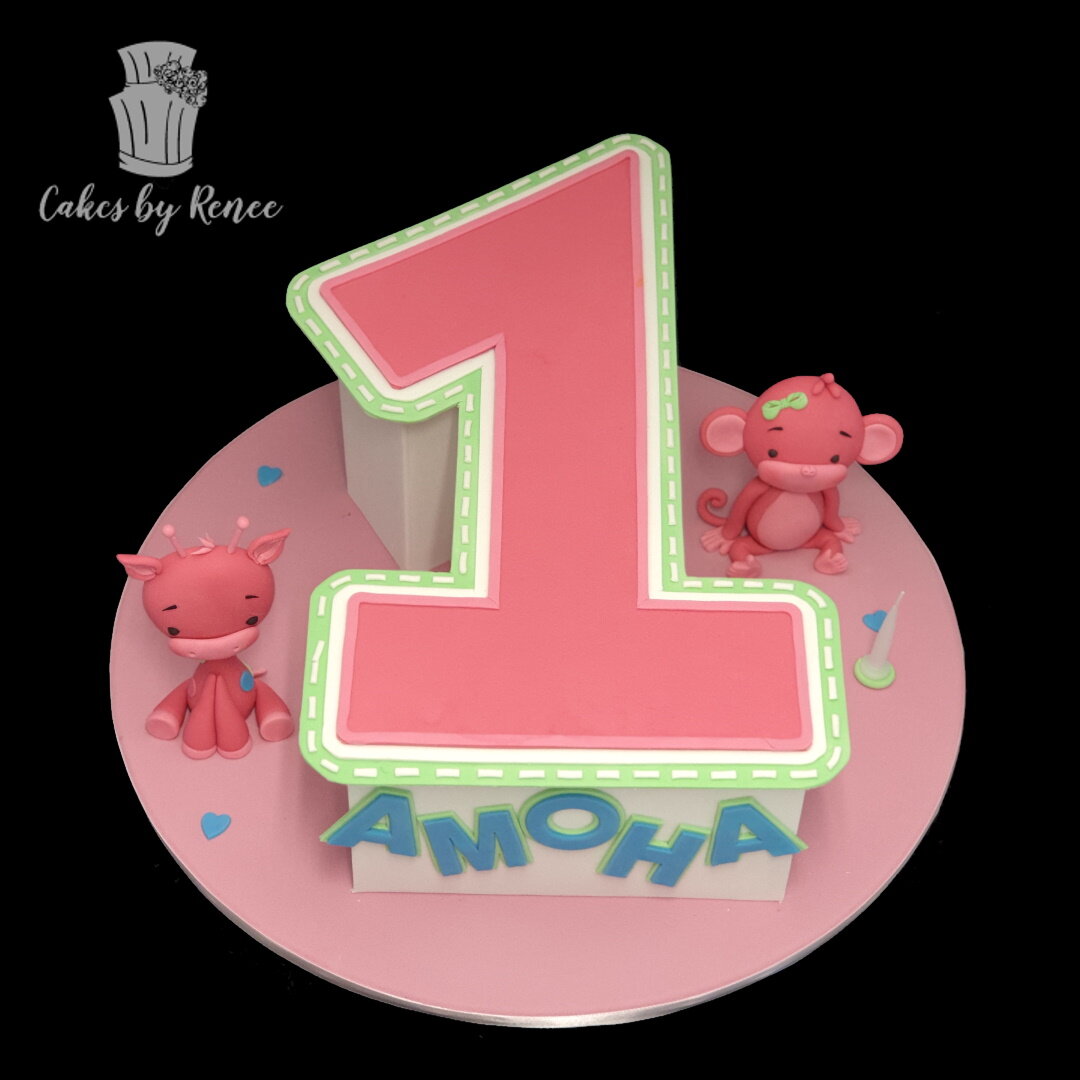 number 1 birthday cake pink green cut out cake monkey giraffe