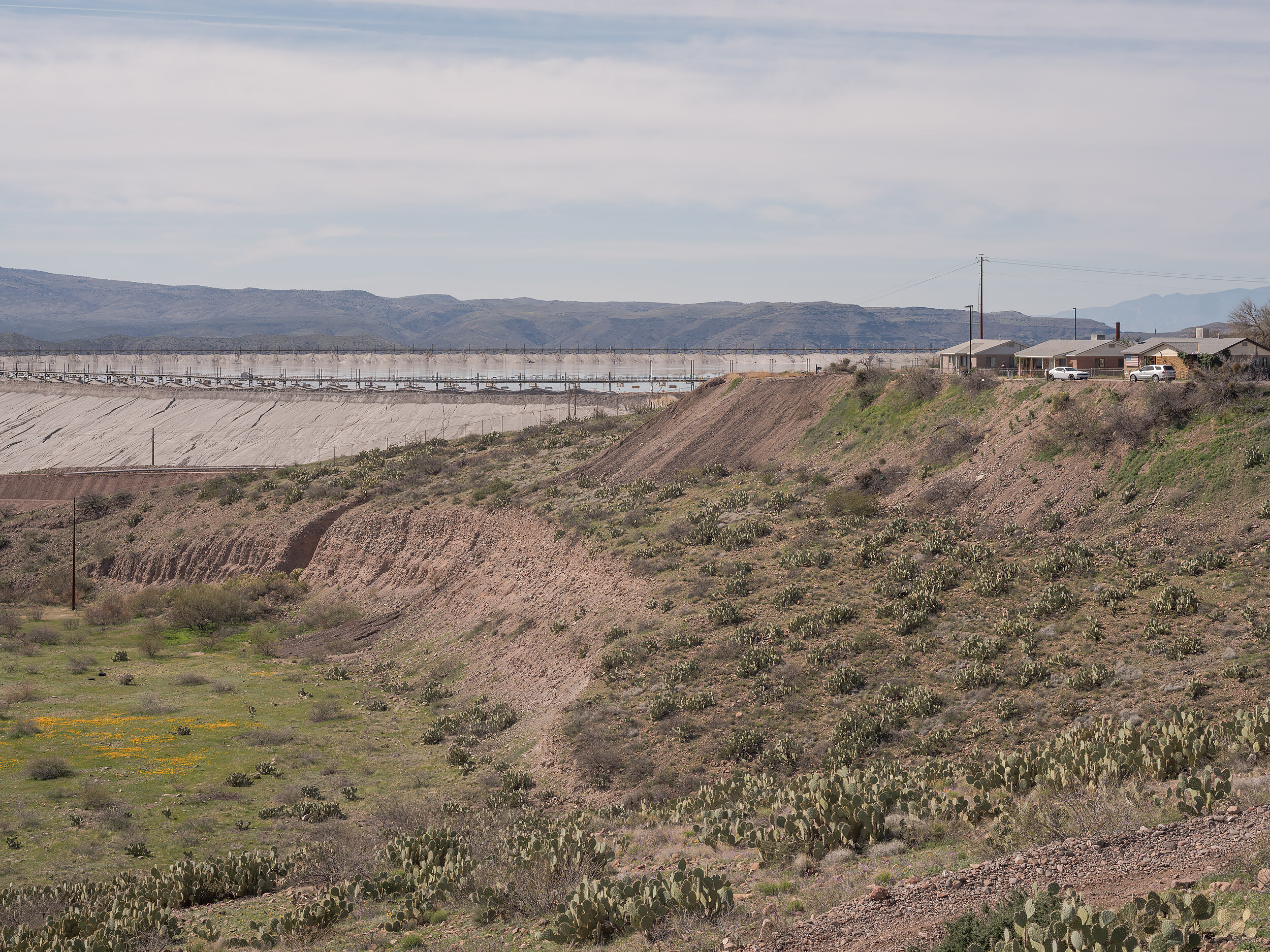 Gila Street homes on the edge of Morenci housing, adjacent to tailings operations